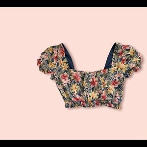 Hello cuties!  We have this beautiful forever 21 flowery top for sale.